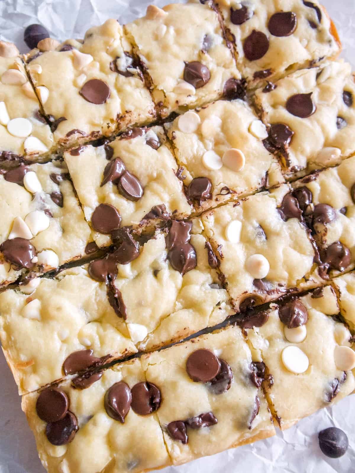 White chocolate brownies sliced with melty chocolate.