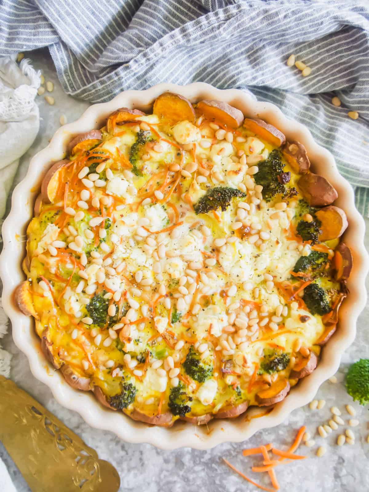 Freshly baked Broccoli Carrot Goat Cheese Quiche with a Sweet Potato Crust.