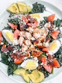Healthy Kale Cobb Salad on a large plate.