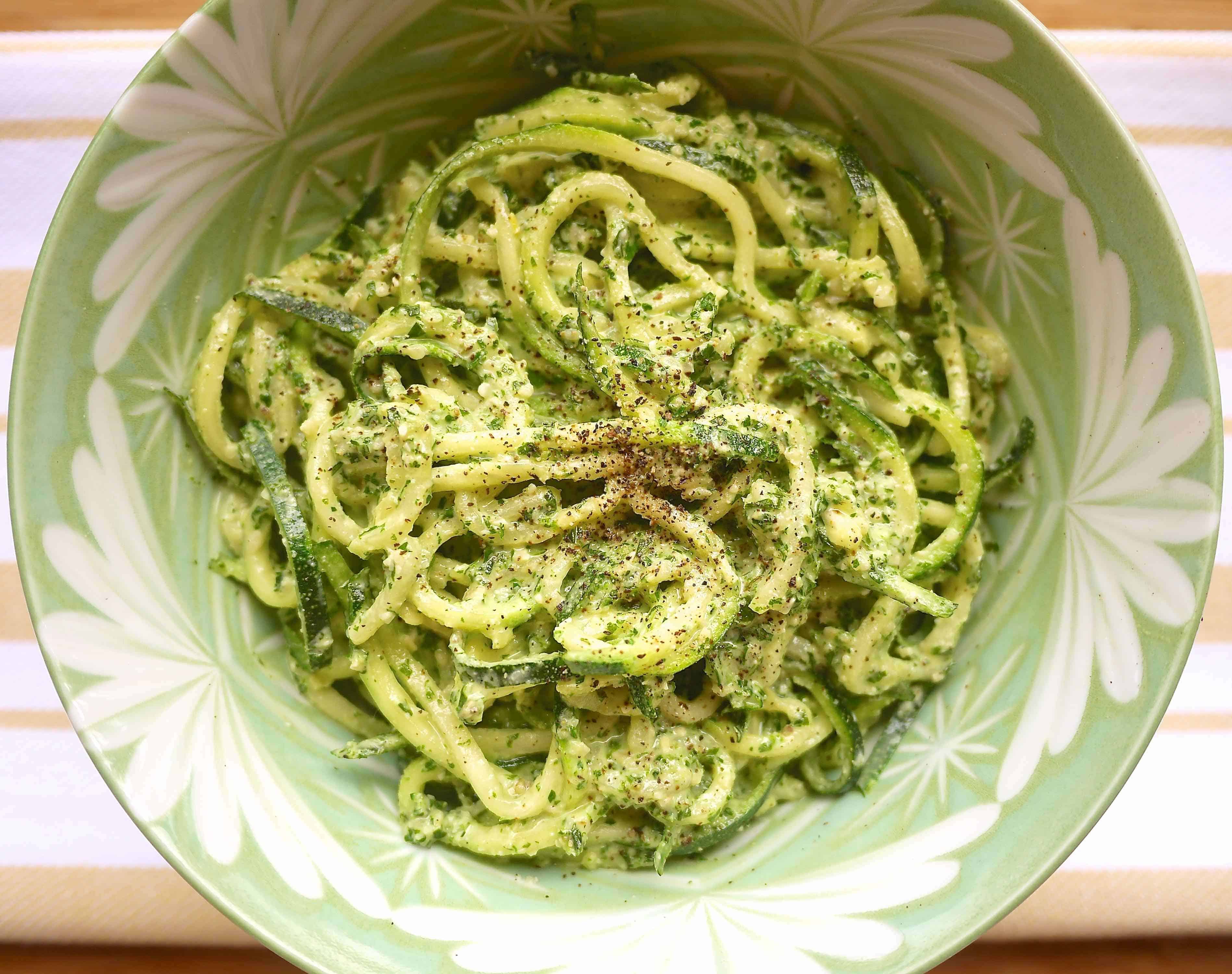 Zucchini noodles with pesto in a bowl.