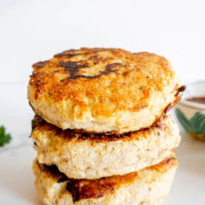 3 healthy burger patties stacked on top of each other.