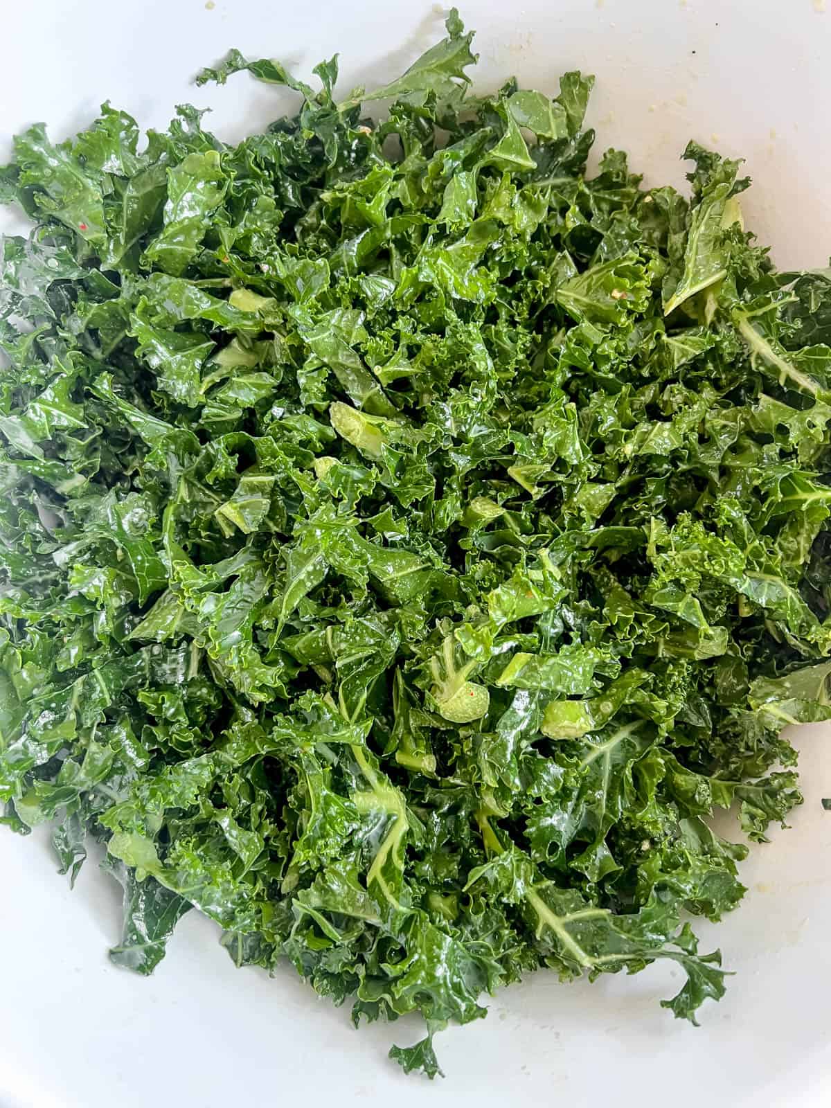 Kale Salad with lemon dressing in a bowl.