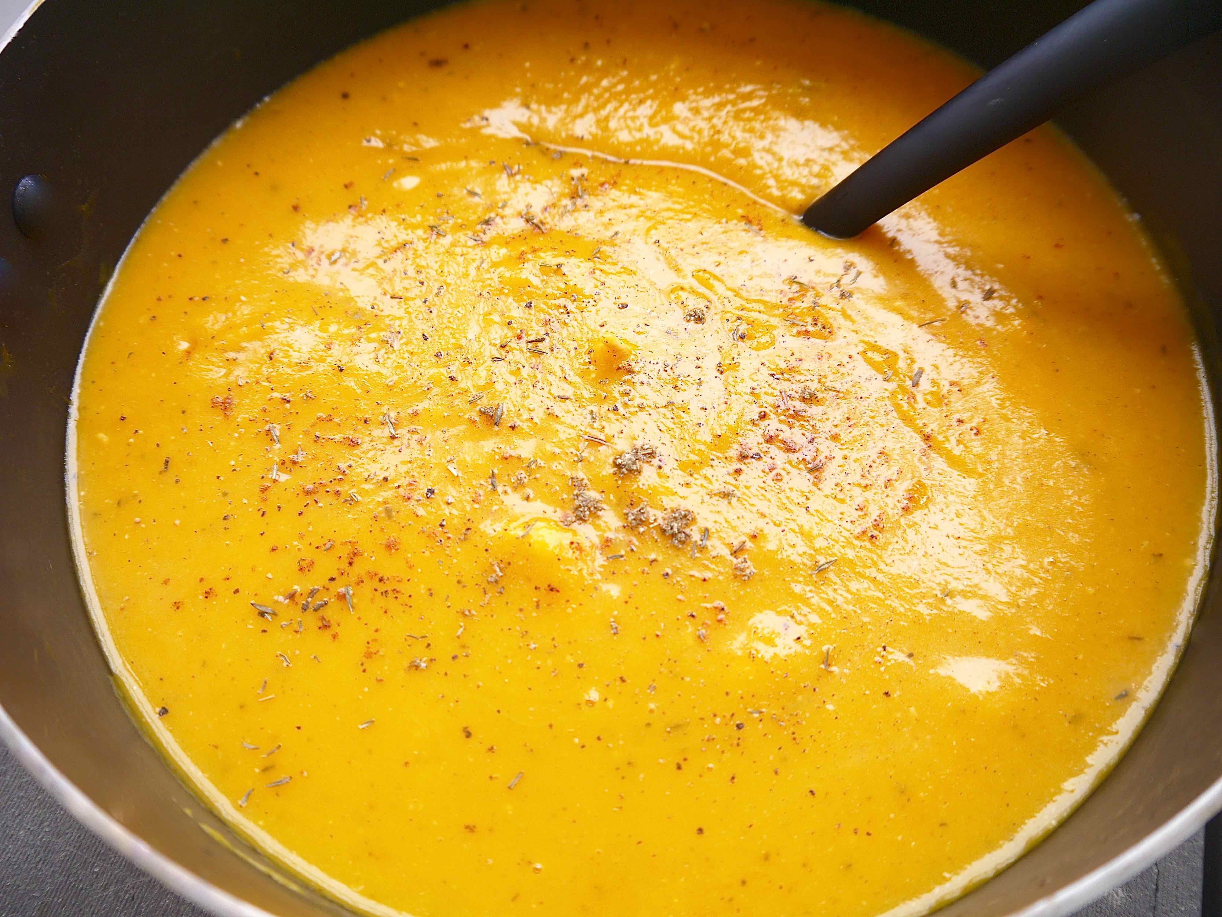 Butternut squash mixed with an immersion blender.