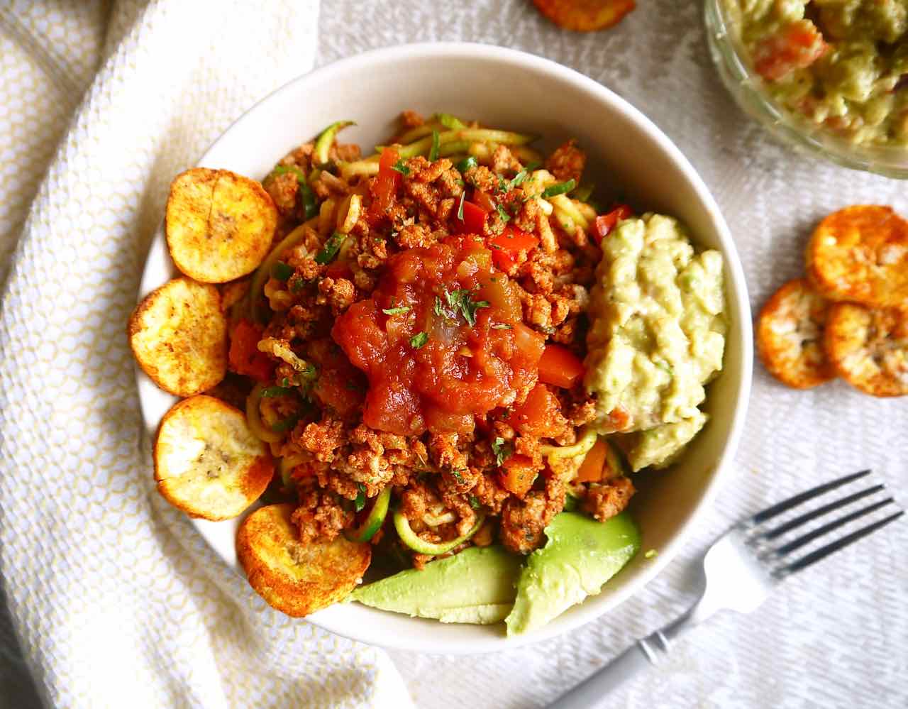Zucchini noodles seasoned with taco ground turkey meat.
