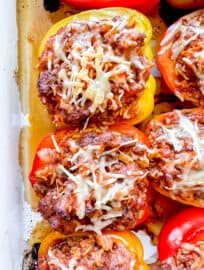Healthy Stuffed Peppers with Ground Beef and Rice in a pan fresh out of the oven.