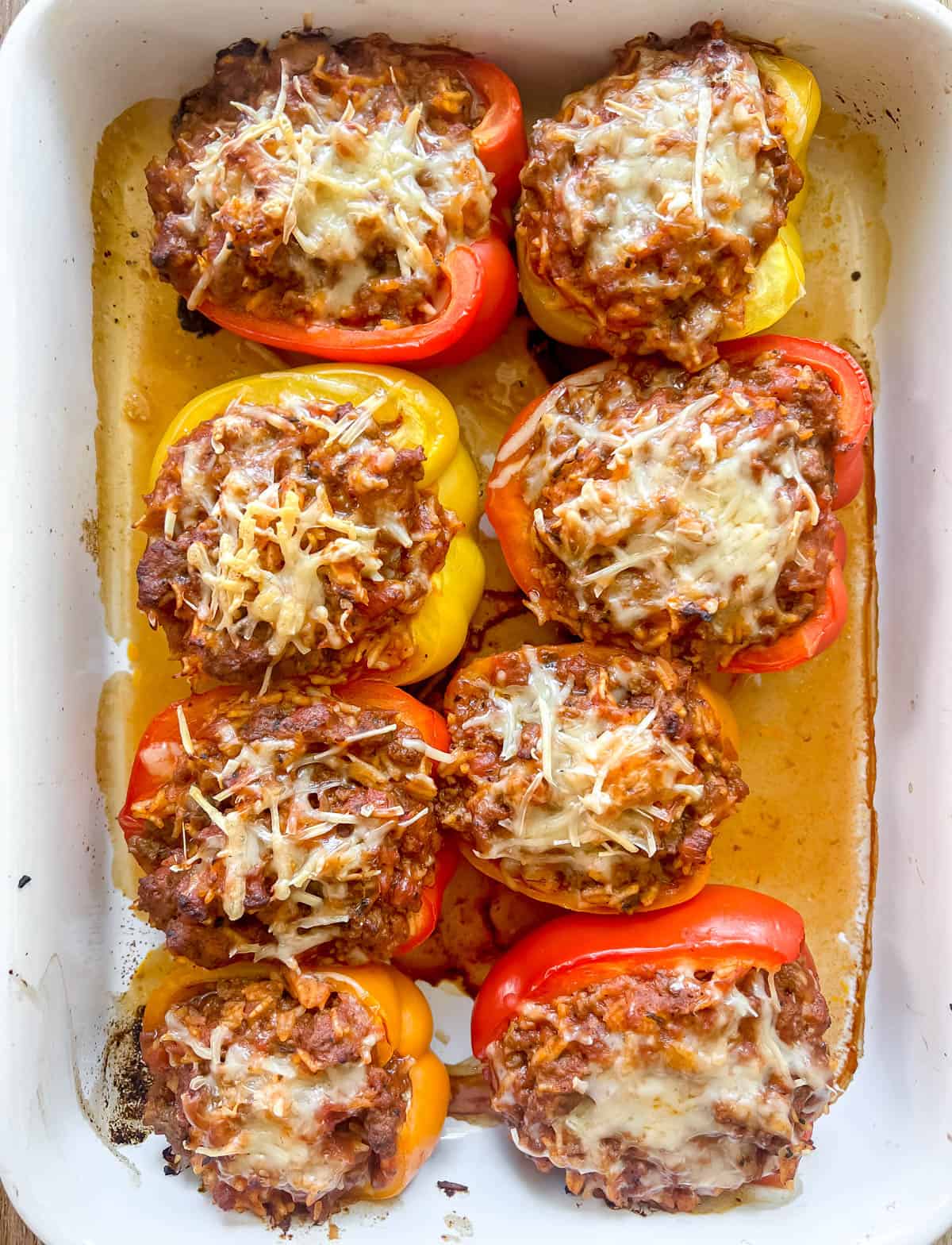 Stuffed peppers recipe with rice and ground beef baked in the oven.