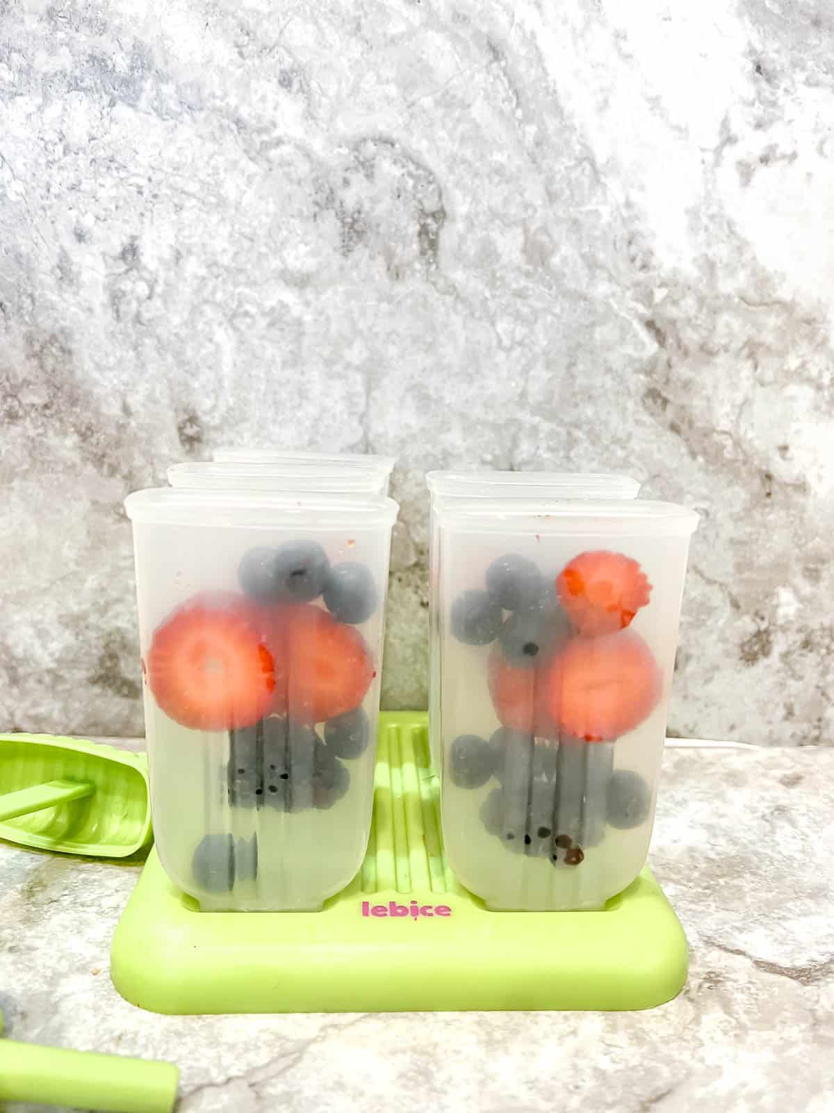 Berries in popsicle molds.