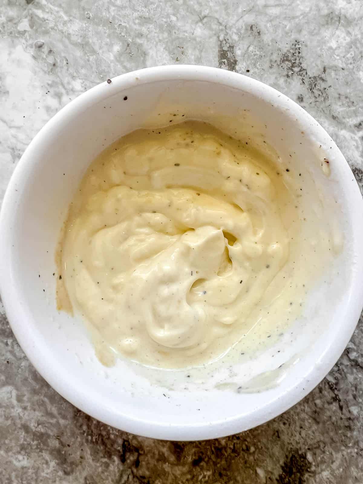 Mayonnaise sauce in a bowl.