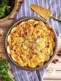 Gluten Free Potato Crust Quiche Lorraine in a large pan, freshly baked.