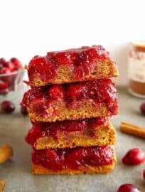 Gluten-free Cranberry Sauce Bars stacked on top of each other.