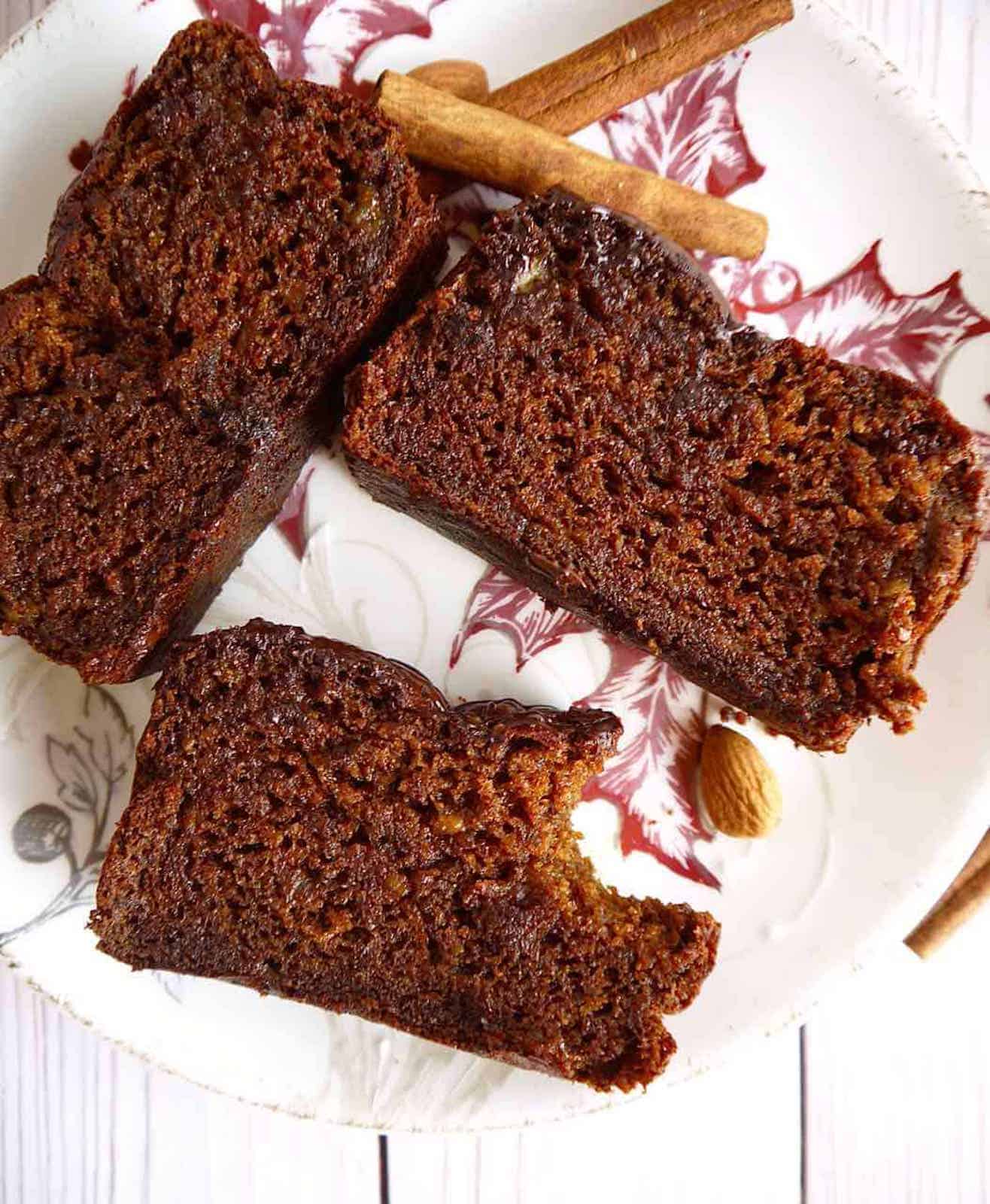 Gingerbread banana bread pieces on a plate.