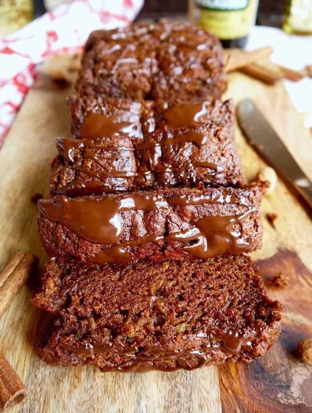 Gingerbread banana bread sliced on a serving tray.