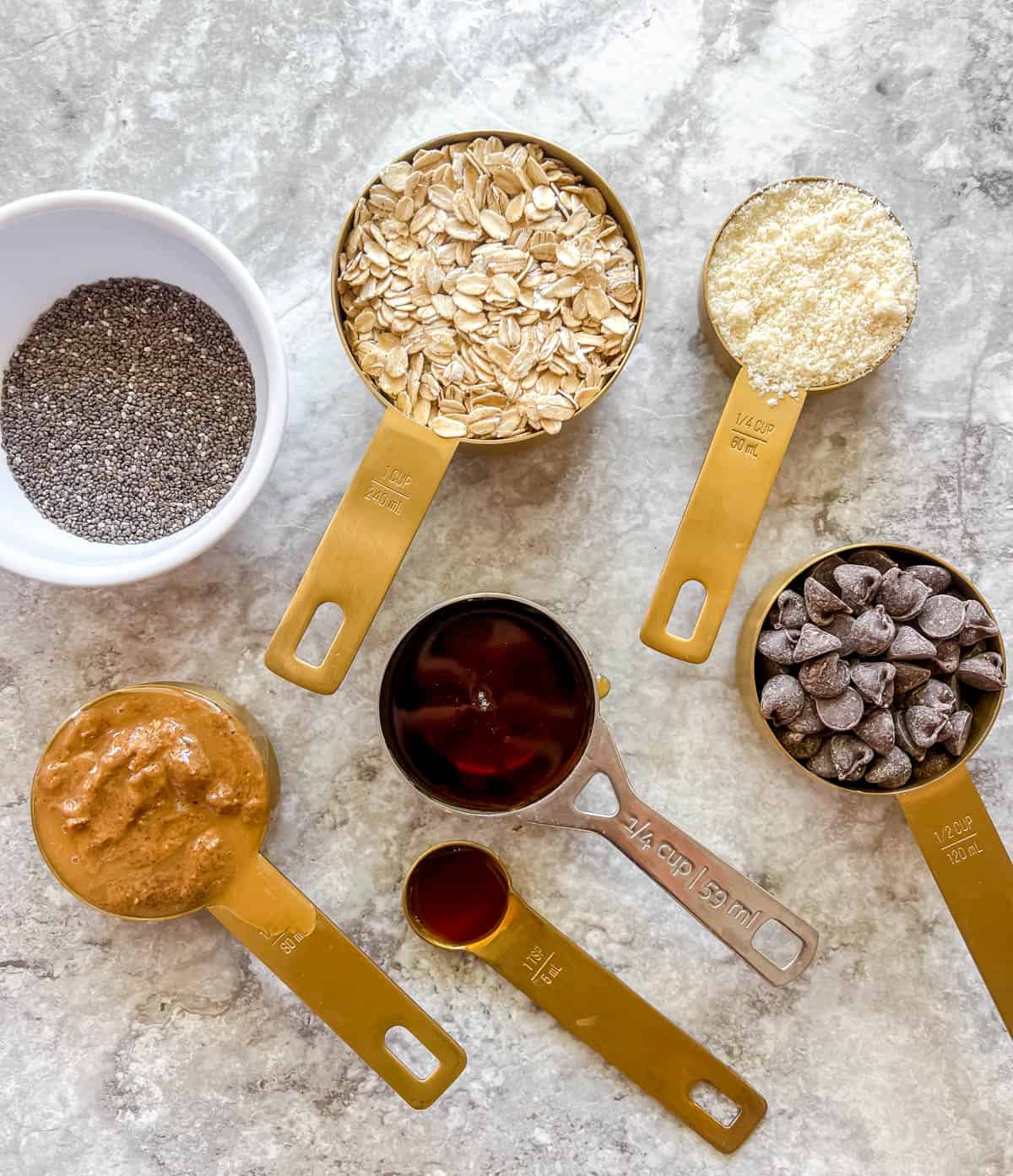 Ingredients needed to make chocolate chip oatmeal balls.