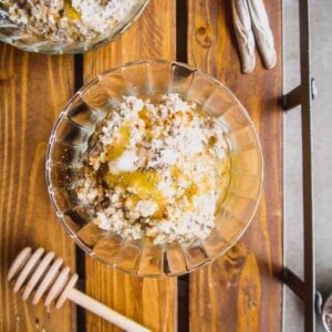 Gluten free steel cut oats recipe in a bowl with honey and chia seeds on top.