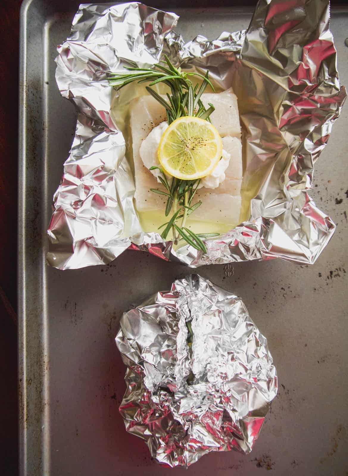 Fish foil packs before baking.