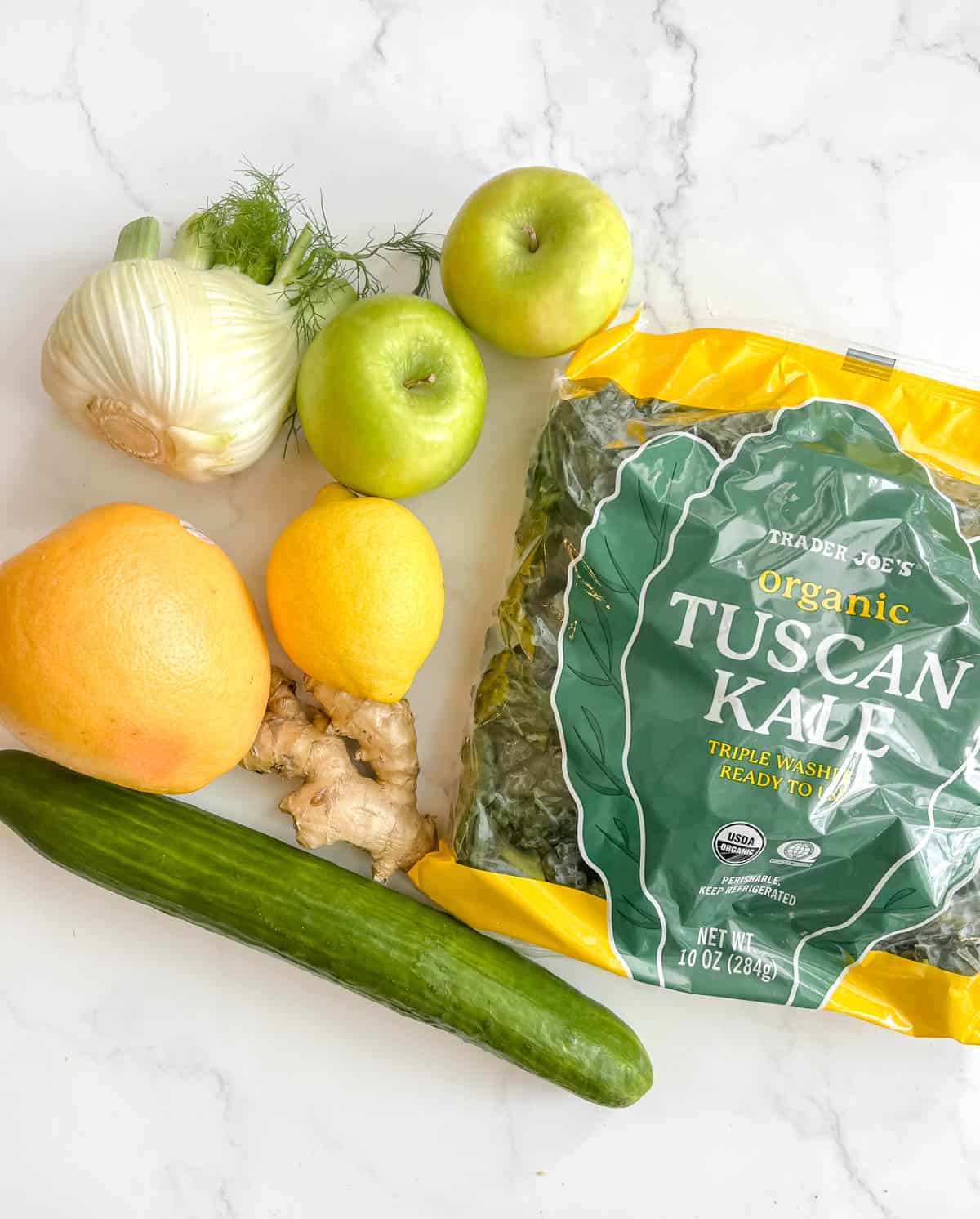 Green Juice with Apple, Fennel, Cucumber, Kale, and Ginger ingredients.