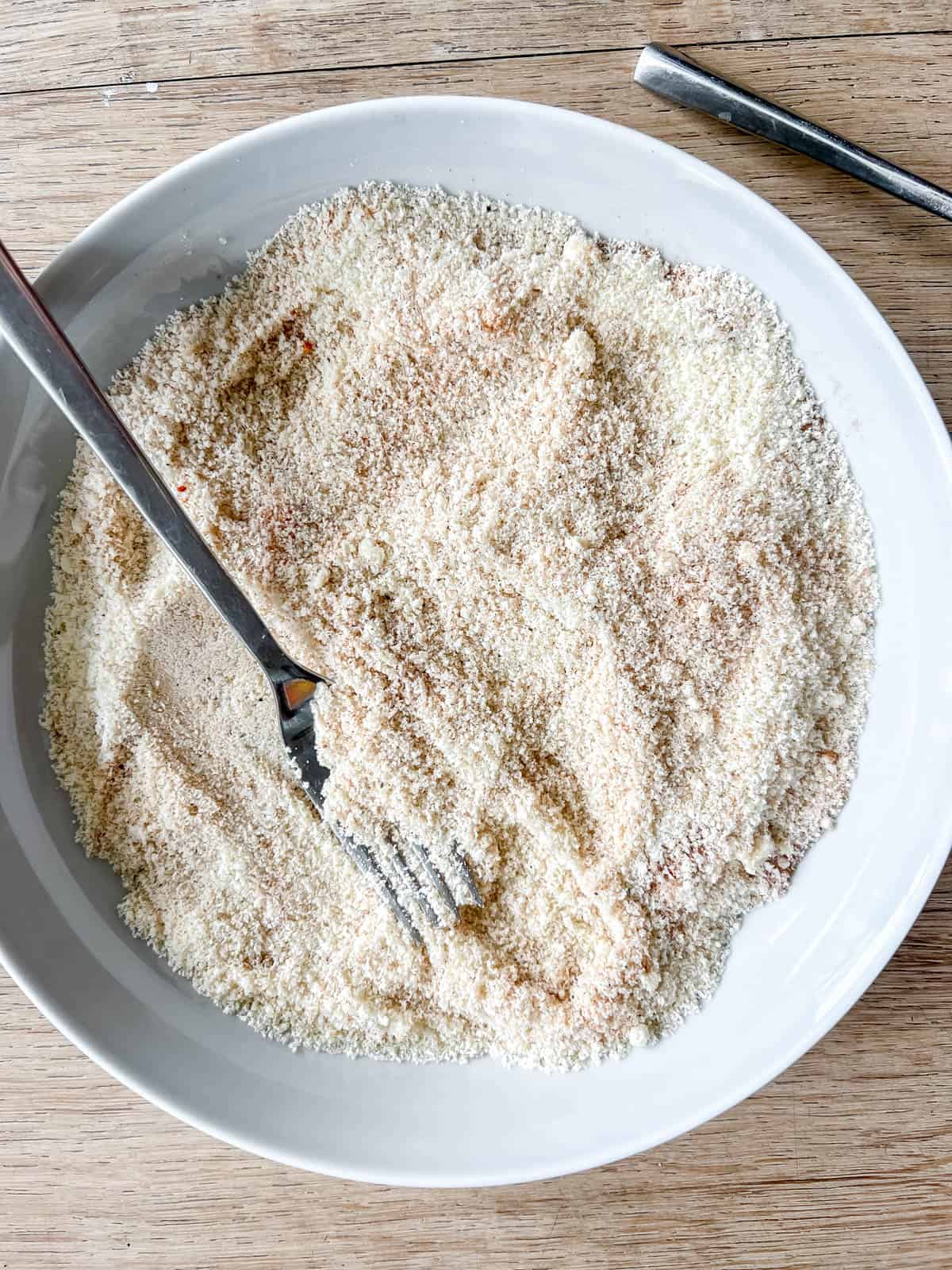 Almond flour breading mixture in a bowl.