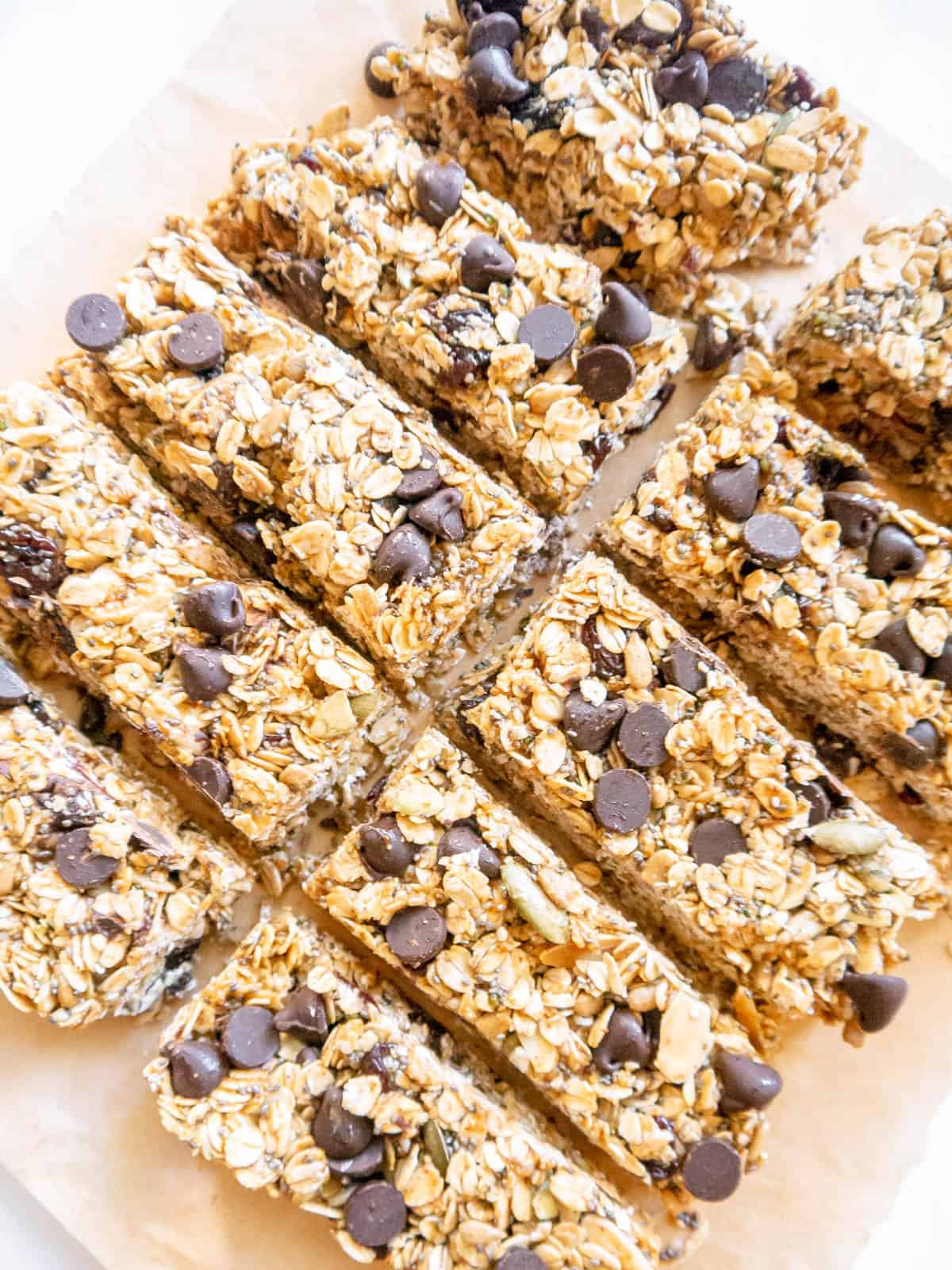 Side angle of no bake gluten-free almond butter granola bars freshly cut.