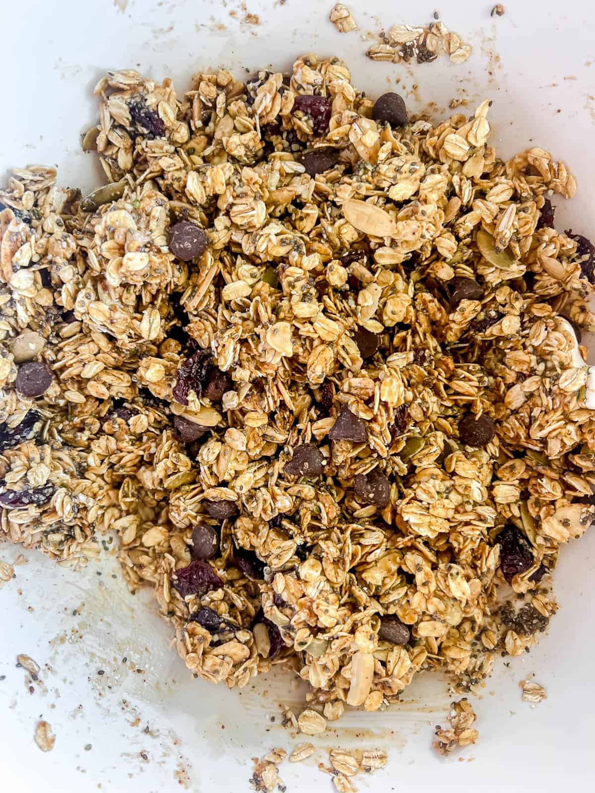 Almond butter mixture mixed into oat mixture.