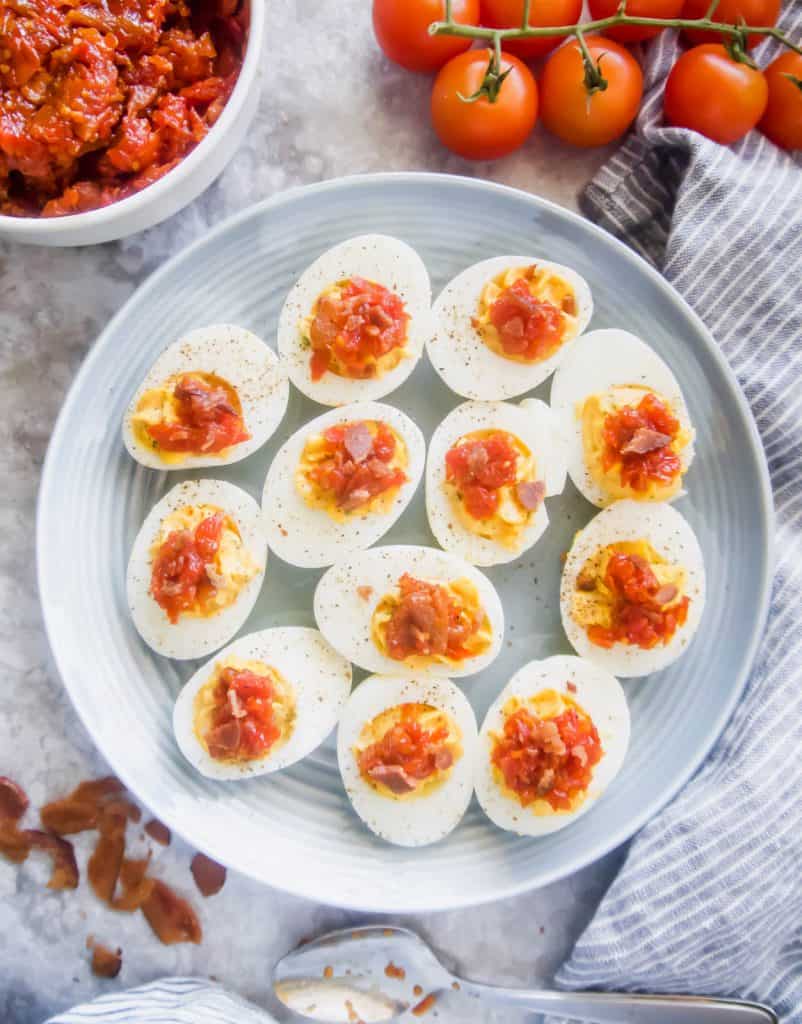 Paleo Deviled Eggs topped with Tomato Bacon Jam (GF) | Perchance to Cook, www.perchancetocook.com
