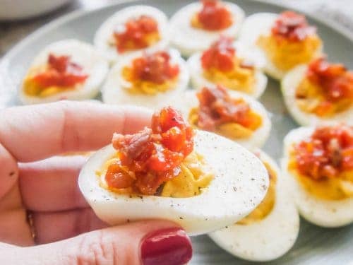 Paleo Deviled Eggs topped with Tomato Bacon Jam (GF)