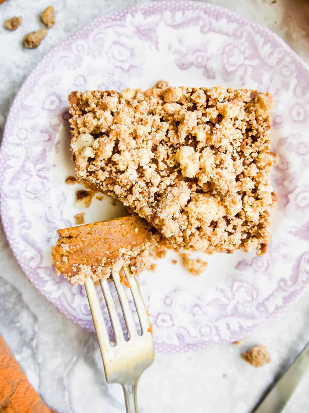 Paleo Pumpkin Coffee Cake with a fork in it.