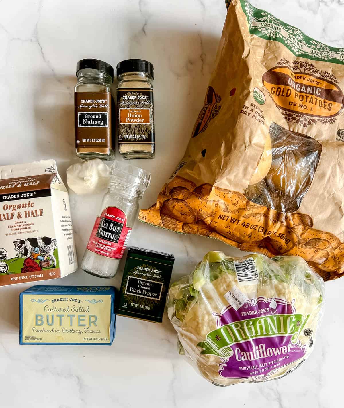 Ingredients needed to make cauliflower and potato mash.