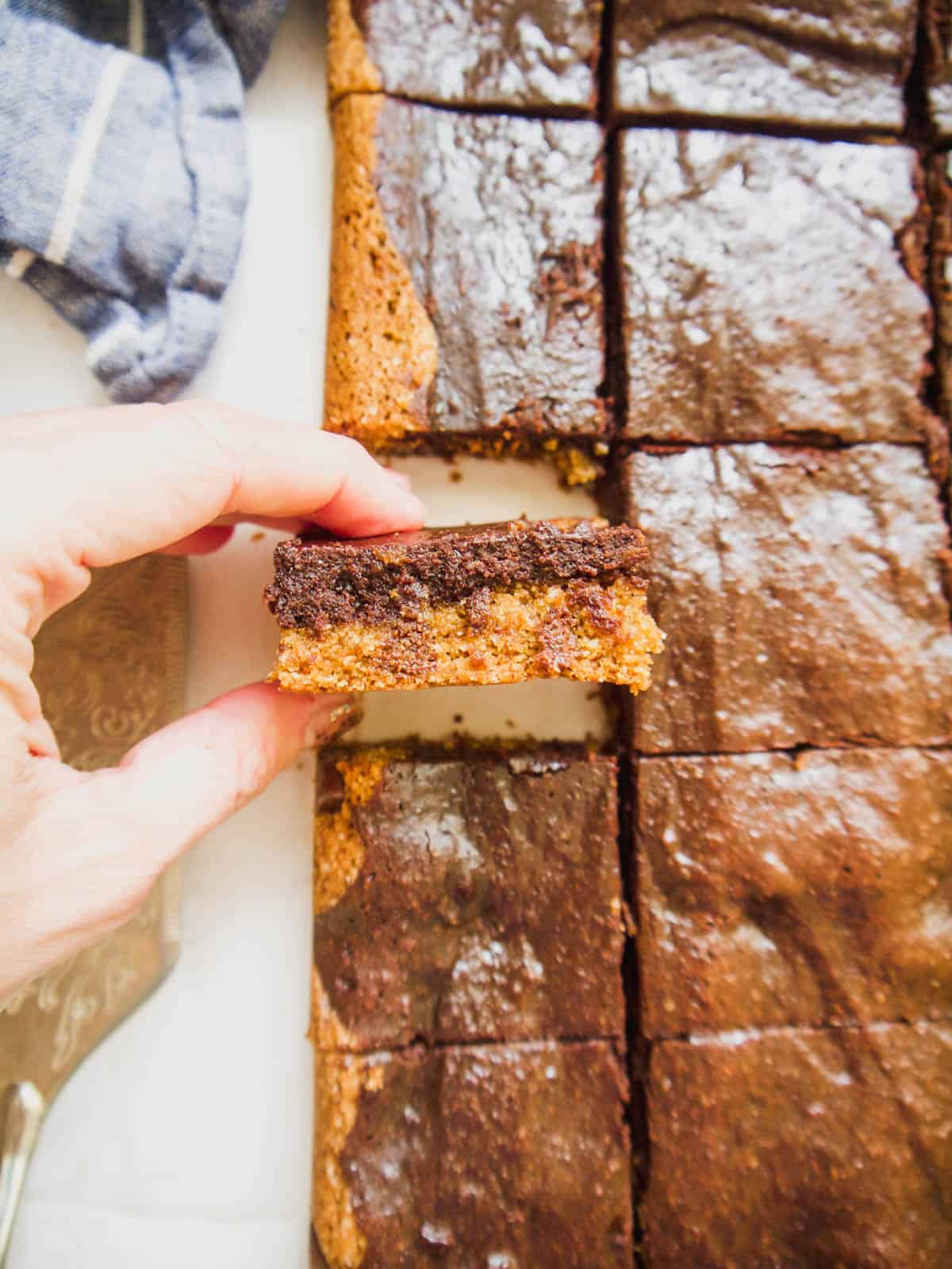 A healthy brookie bar in one's hands.