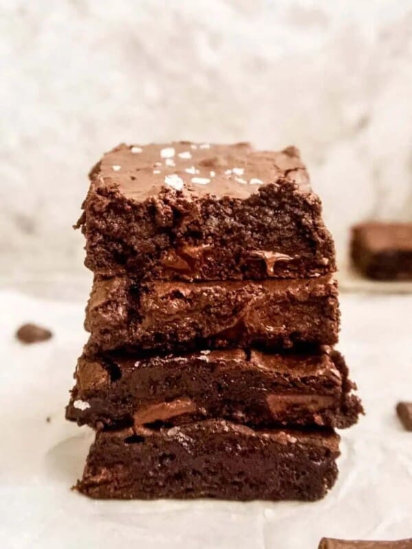 A stack of gluten-free olive oil brownies.