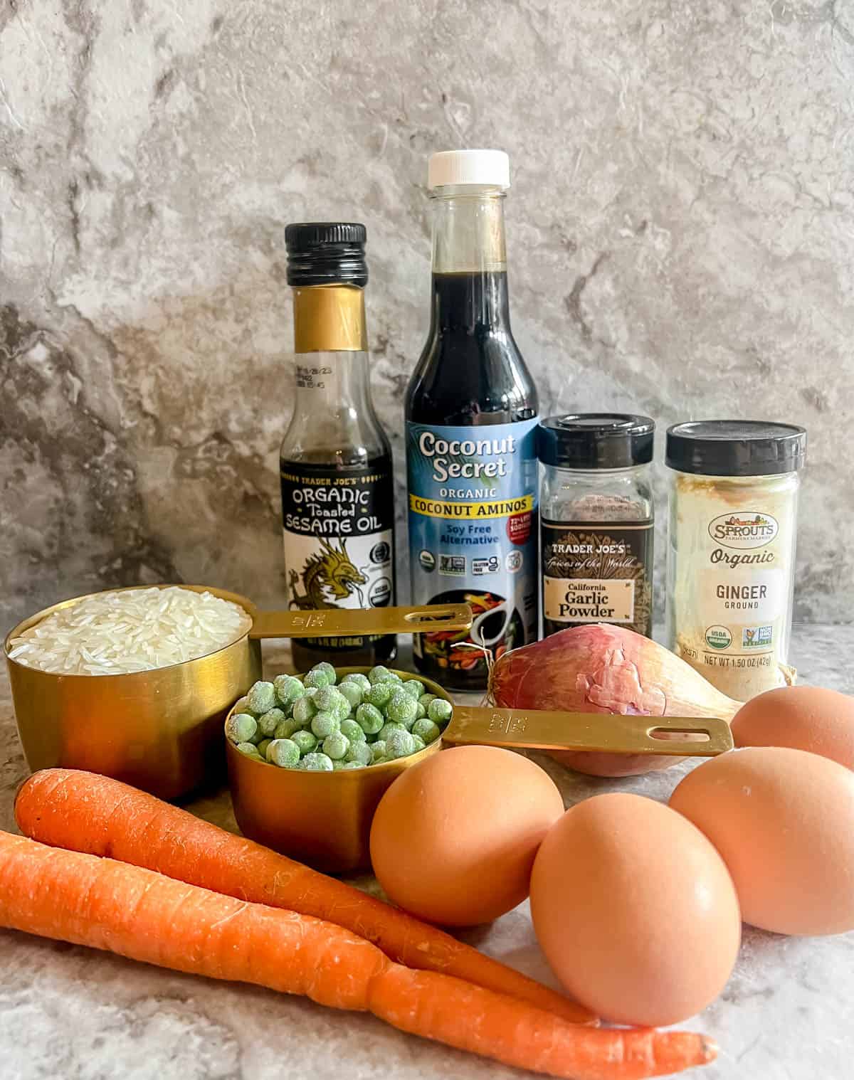 Ingredients needed to make coconut aminos fried rice.