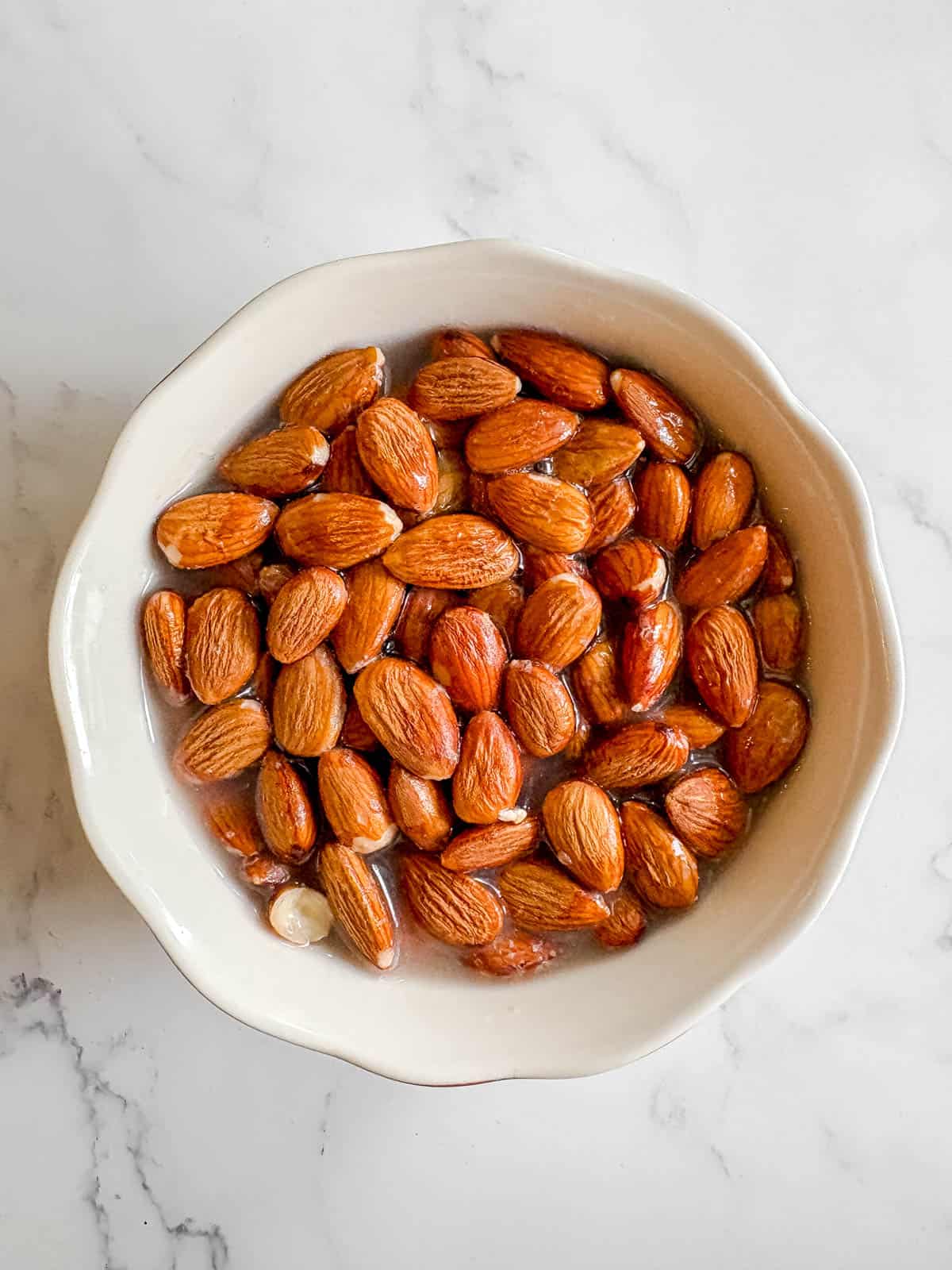 Almonds soaking in water.