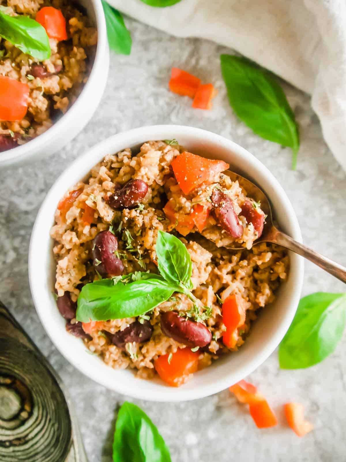 Ground Turkey, Rice and Beans in a bowl with a spoon.