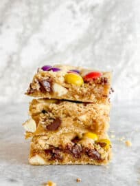 Gluten Free Cookie Bars stacked on top of each other.