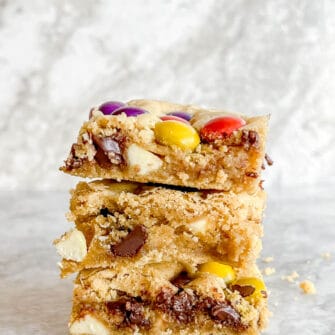 Gluten Free Cookie Bars stacked on top of each other.