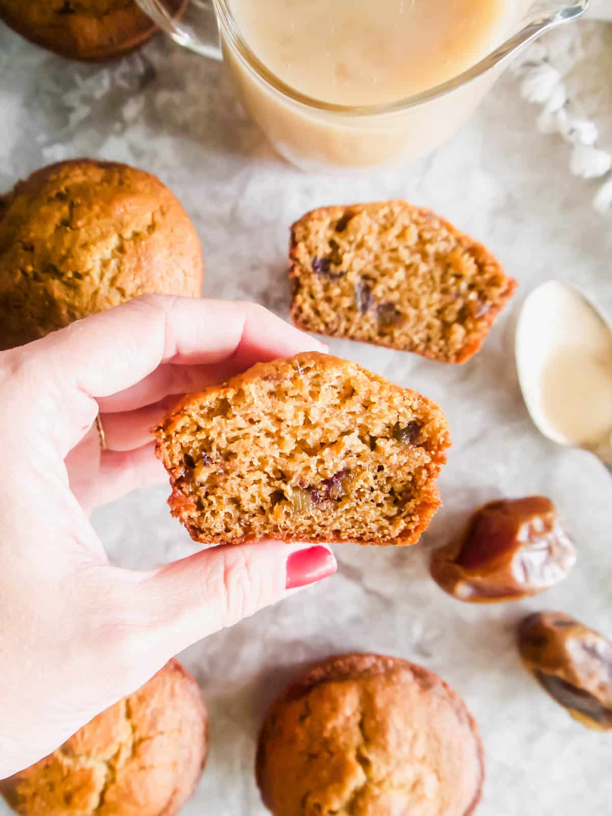 A healthy sticky toffee pudding muffin cut in half.