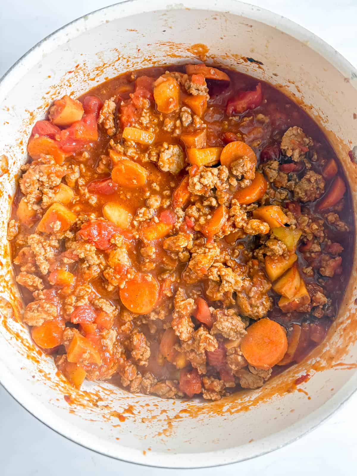 Tomato sauce added to chili.
