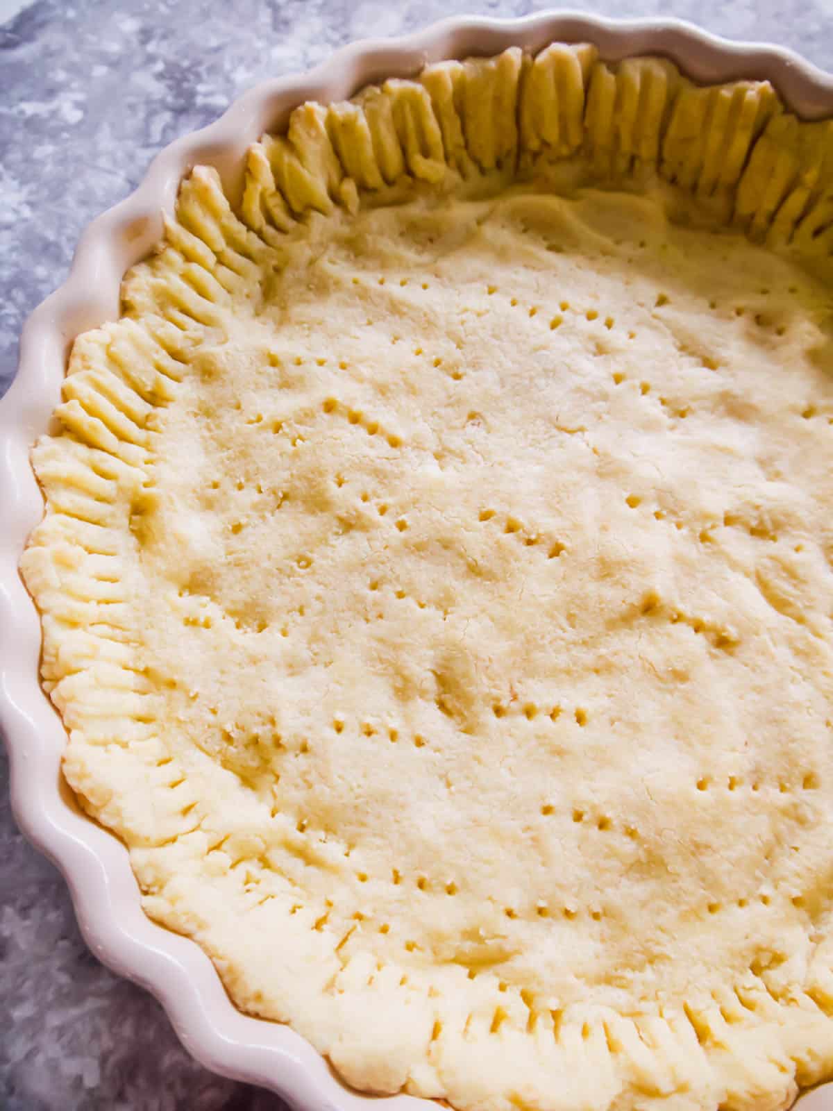 Paleo pie crust in a pan.