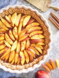 Nectarine tart with serving spatula next to it.