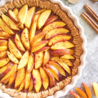 Nectarine tart with serving spatula next to it.
