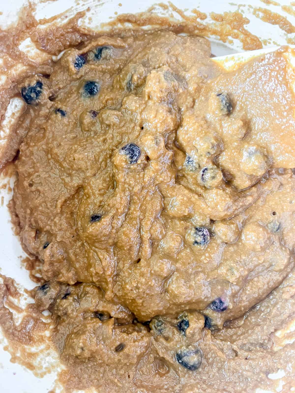 The blueberries folded into the paleo muffin batter.