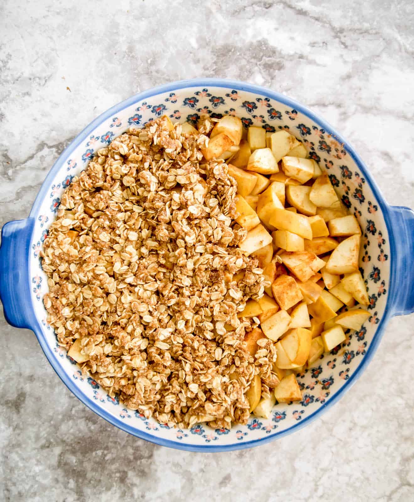 Almond and oat topping on top of pre-baked apples.
