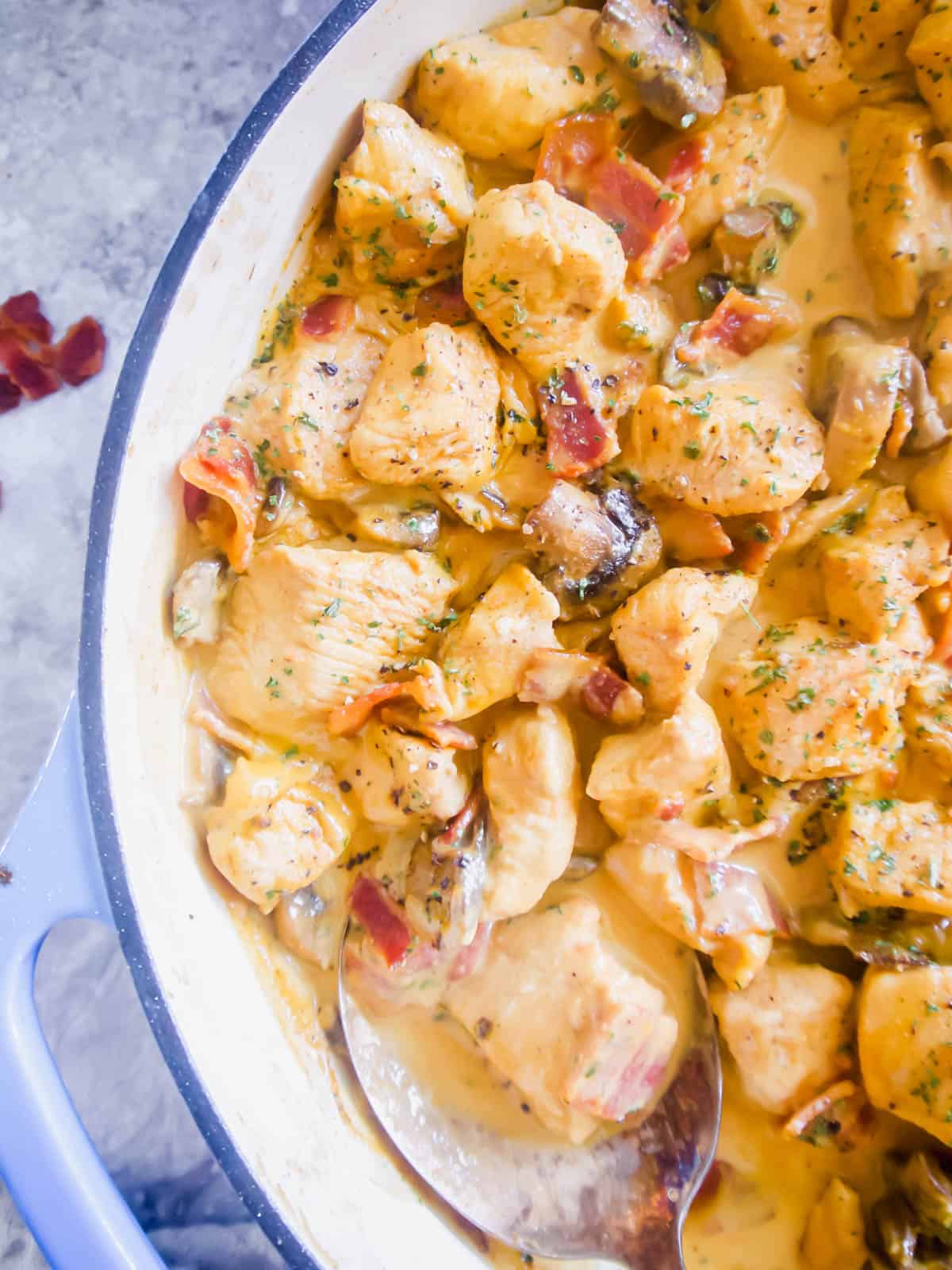 Creamy Dairy-free Bacon and Mushroom Chicken in a pan after cooking.