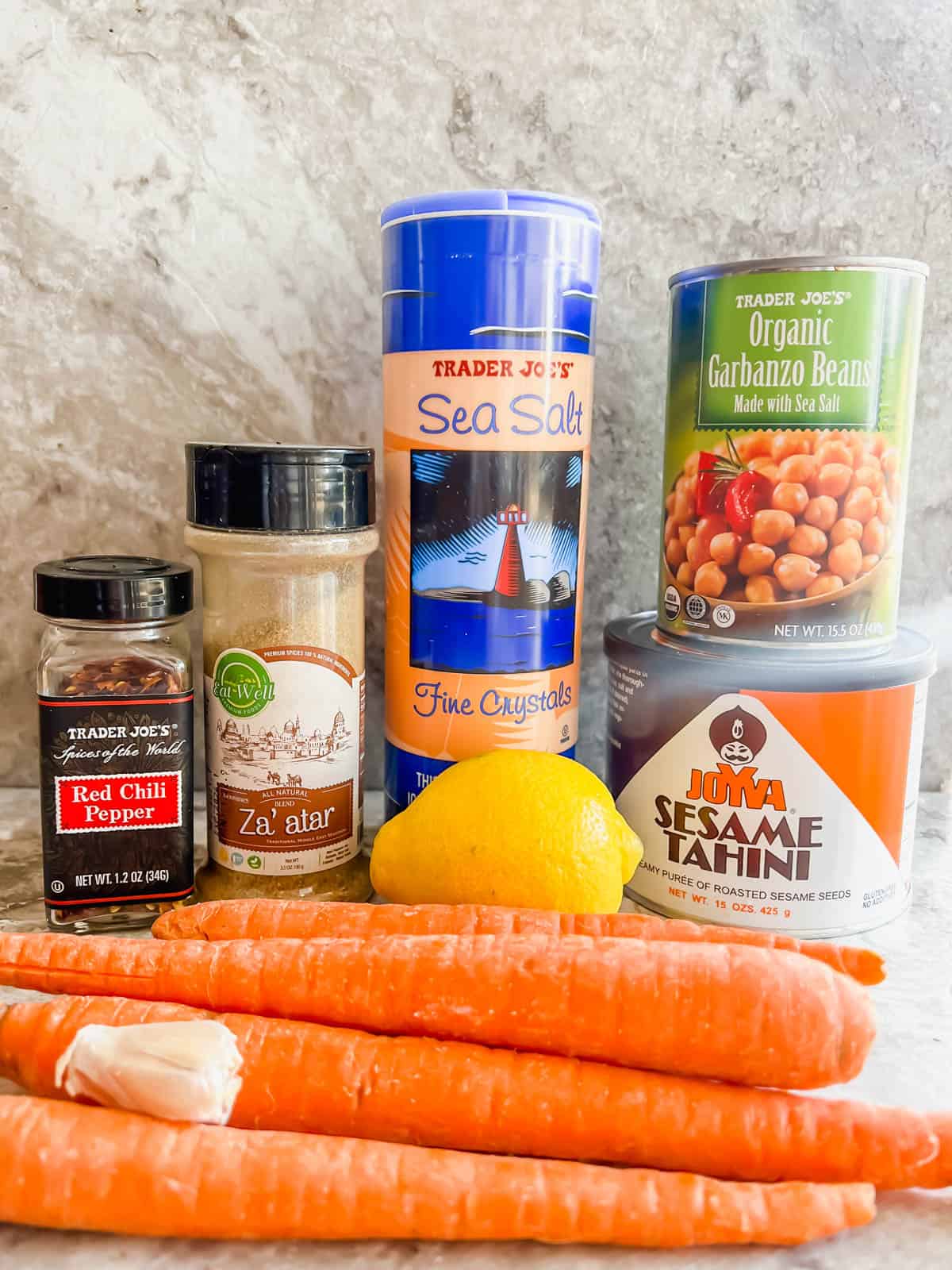 Ingredients needed to make roasted carrot hummus.