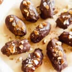 Chocolate Covered Pumpkin Stuffed Dates on a plate