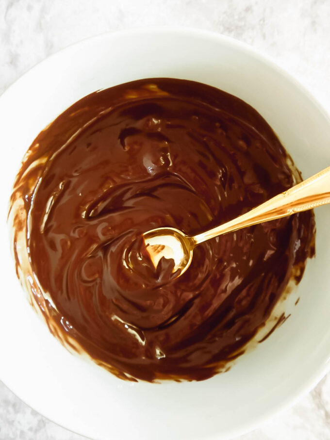 Melted dairy-free chocolate.