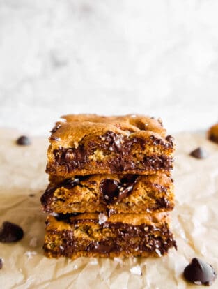 Almond Flour Egg Yolk Chocolate Chip Cookie Bars stacked on top of each other