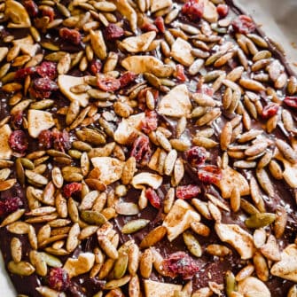 Fall Chocolate Bark with Dried Apples and Roasted Pepitas in pan