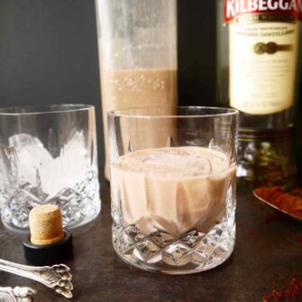 Homemade Dairy free Irish Cream Liqueur Recipe in a glass with ice.
