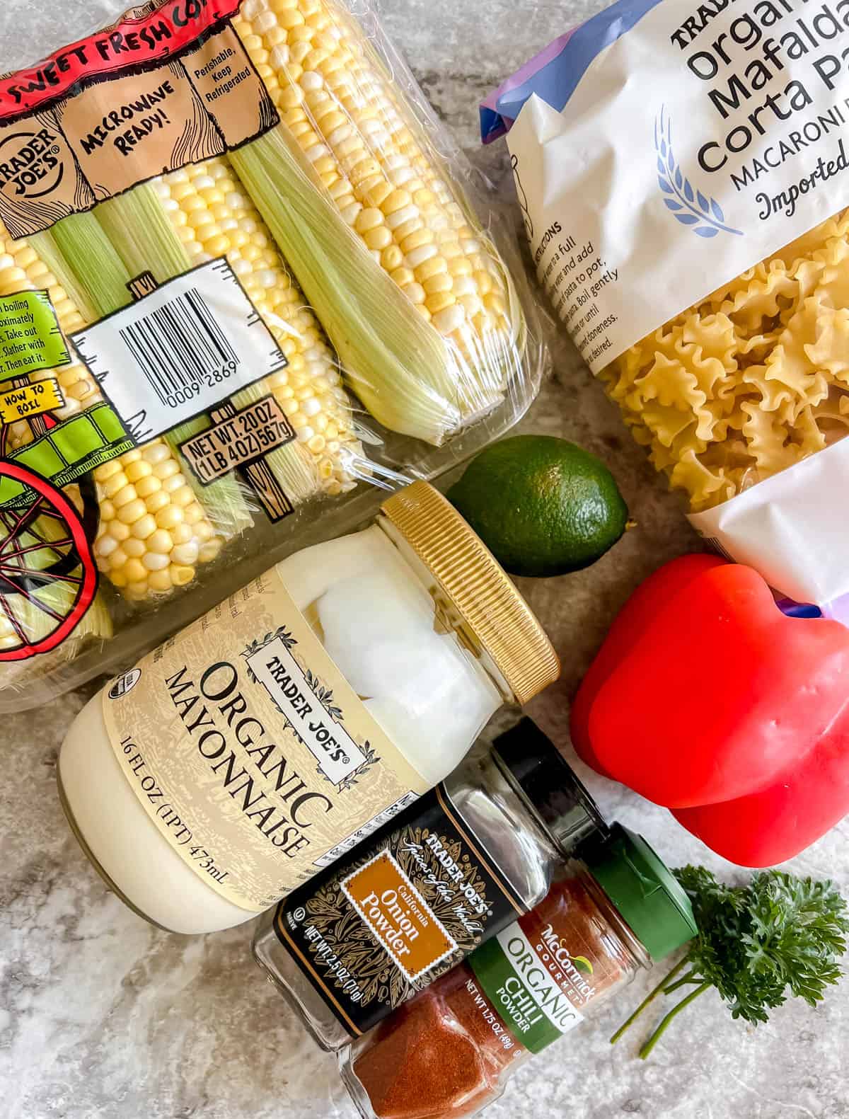 Ingredients needed to make Mexican street corn salad.