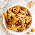 Maple roasted pepitas in a bowl.